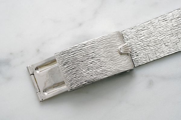 the-watch-comes-with-a-white-gold-bracelet-with-bark-finish-which-was-added-by-its-current-owner-fol_s600x0_q80_noupscale.jpg