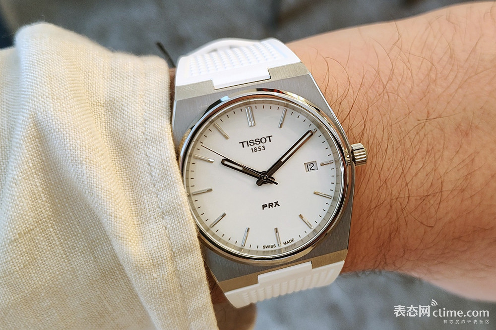 Tissot-PRX-White-Dial-with-White-Rubber-Strap-on-Wrist.jpg